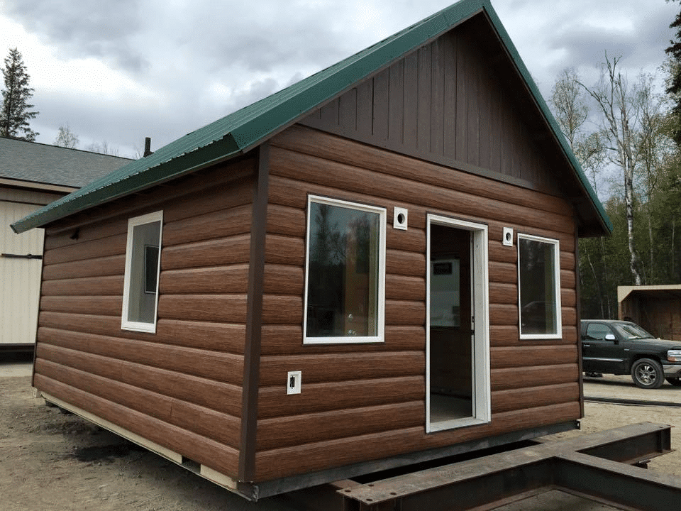 Vertical Siding Added to Horizontal Logs